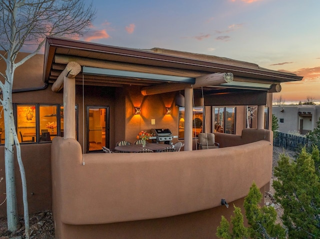 972 Indian Ridge Rd, Santa Fe, NM 87501 - rear view of property featuring fence and stucco siding