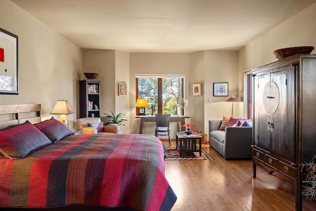 972 Indian Ridge Rd, Santa Fe, NM 87501 - bedroom with light wood-style floors