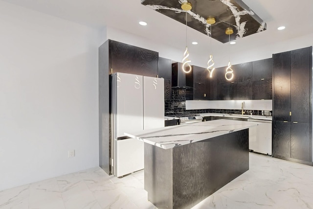 kitchen with dishwasher, freestanding refrigerator, hanging light fixtures, marble finish floor, and a center island