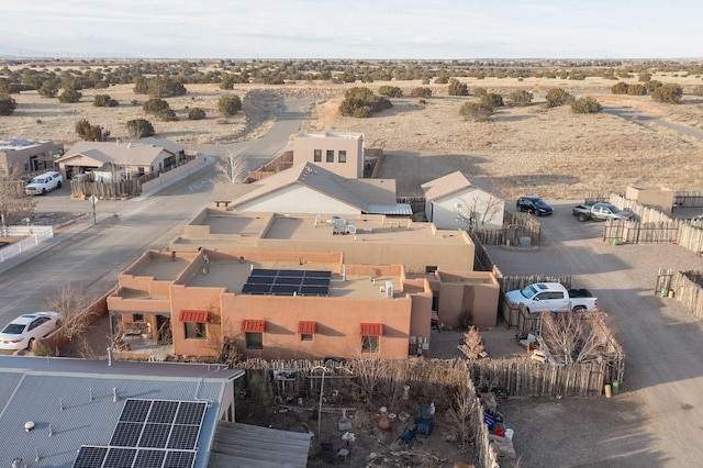 birds eye view of property with a residential view