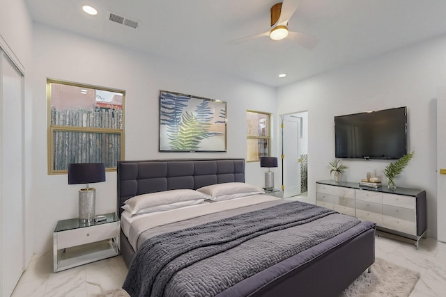 bedroom with marble finish floor, visible vents, a ceiling fan, and recessed lighting