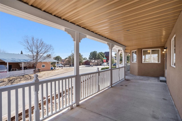 view of patio featuring a porch