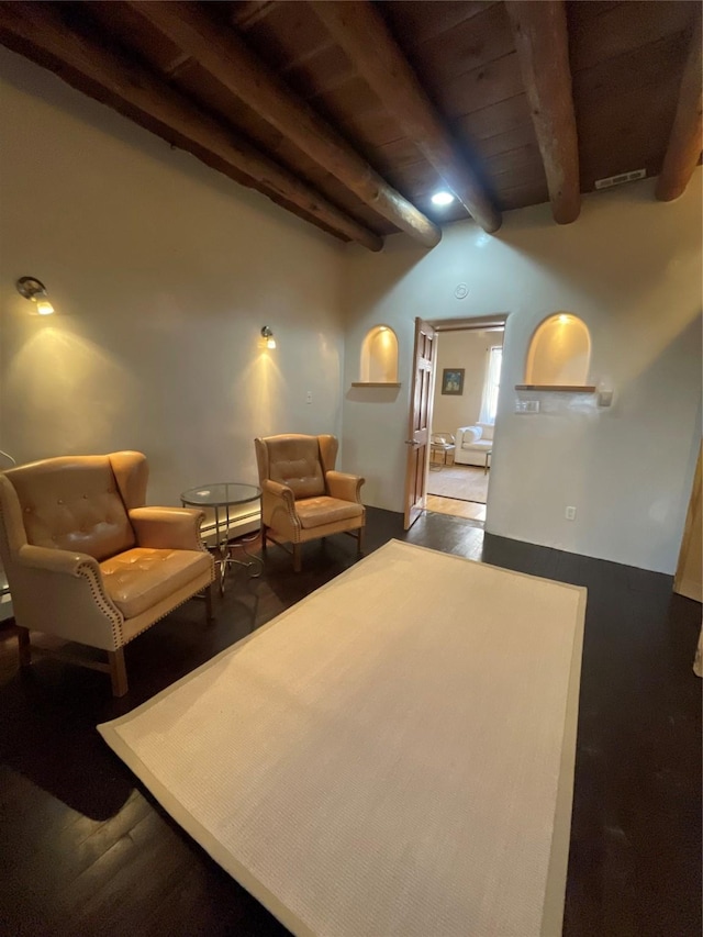 sitting room with wood ceiling and beam ceiling