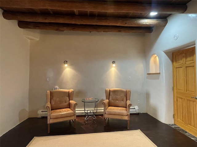 sitting room with beamed ceiling, baseboard heating, and wooden ceiling