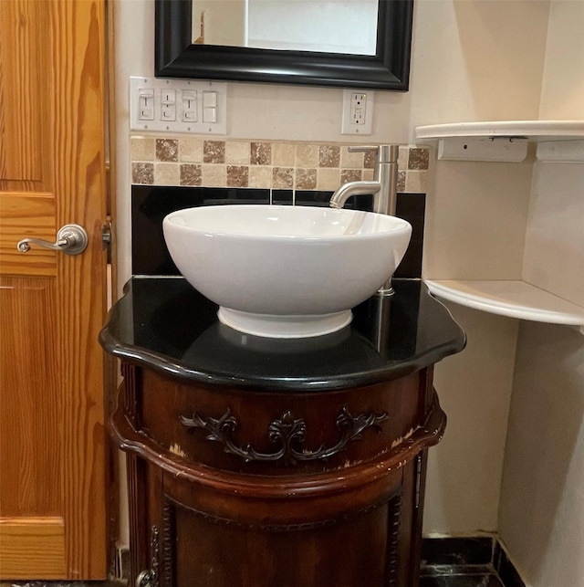 bathroom with wainscoting, tile walls, and vanity