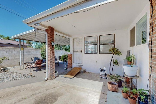 view of patio / terrace with fence