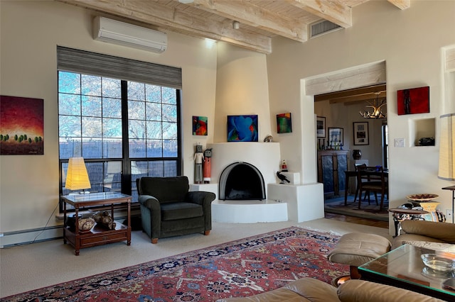 carpeted living area with beam ceiling, a fireplace, a wall mounted AC, a baseboard heating unit, and wood ceiling