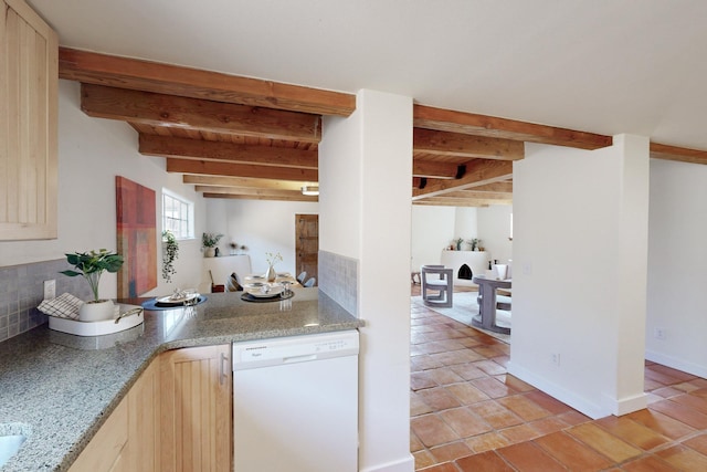 kitchen with backsplash, light brown cabinets, white dishwasher, light tile patterned flooring, and beamed ceiling