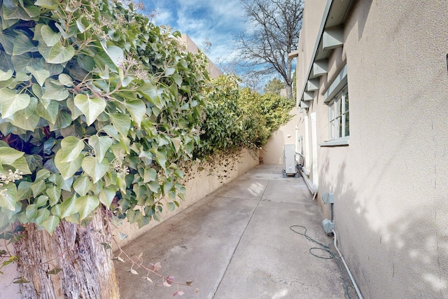 view of patio featuring fence