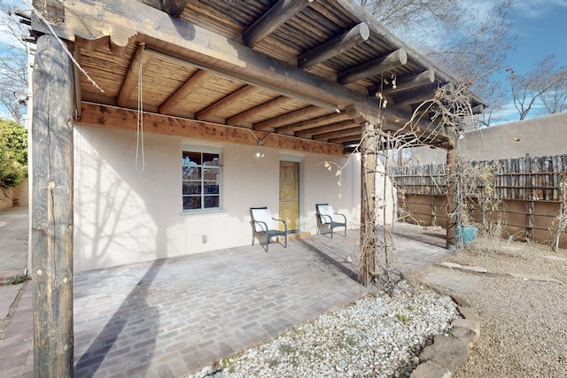 view of patio with fence