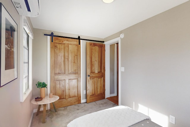 bedroom with multiple windows, baseboards, and light colored carpet