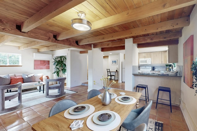 dining area with wood ceiling, beam ceiling, and light tile patterned flooring