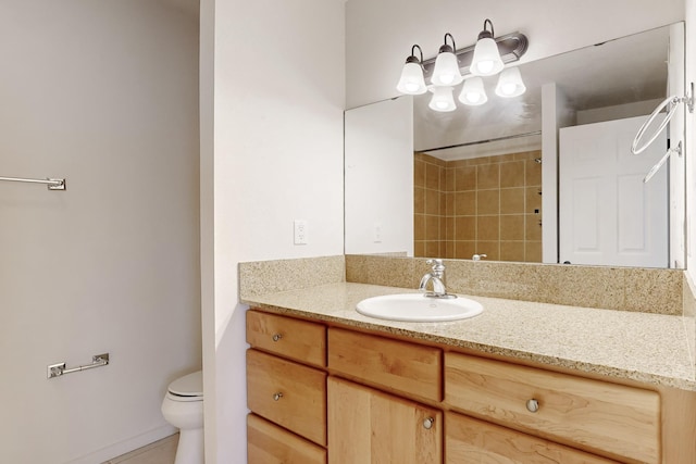 full bathroom with a shower, vanity, and toilet