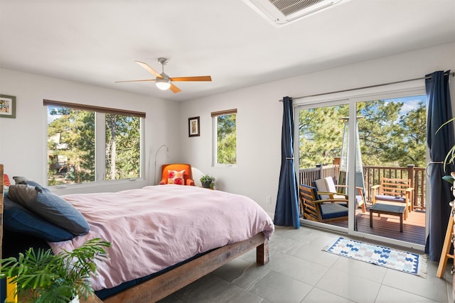 bedroom with light tile patterned floors, access to outside, visible vents, and ceiling fan