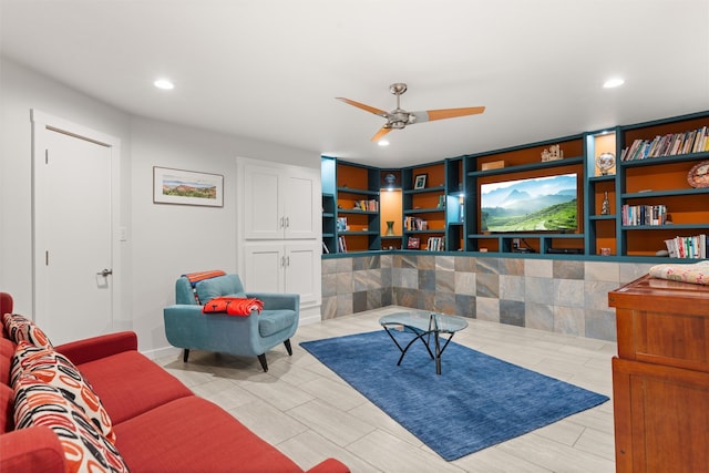 living room featuring recessed lighting and ceiling fan