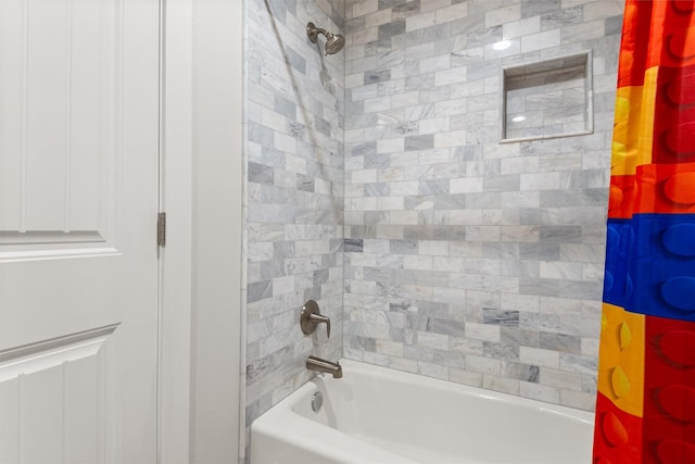 full bath featuring shower / bath combo with shower curtain