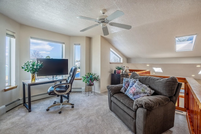 office area featuring light carpet, a baseboard heating unit, a textured ceiling, and baseboards