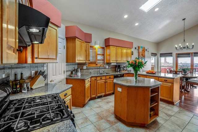 kitchen with a sink, exhaust hood, a center island, open shelves, and gas stove