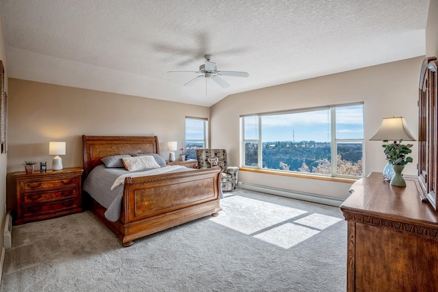 bedroom featuring carpet, ceiling fan, a textured ceiling, and a baseboard radiator