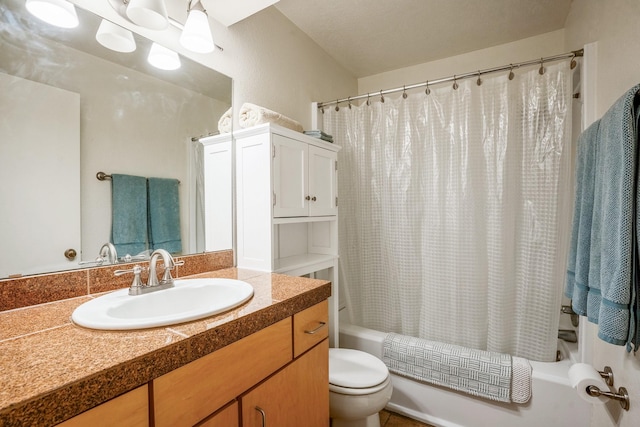 bathroom with shower / bathtub combination with curtain, toilet, and vanity