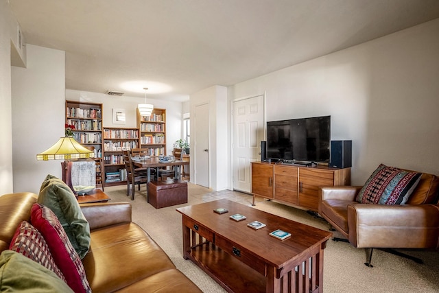 living room with light colored carpet