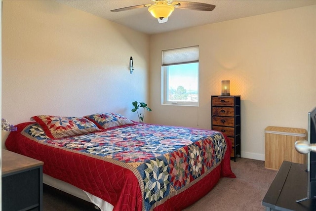 bedroom with carpet flooring, ceiling fan, and baseboards