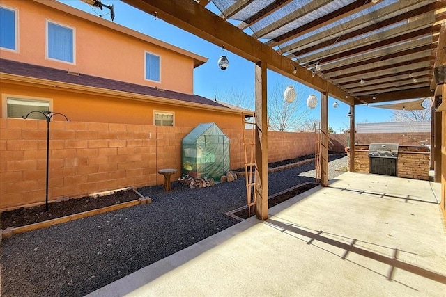 view of patio / terrace featuring a fenced backyard, grilling area, area for grilling, and a pergola