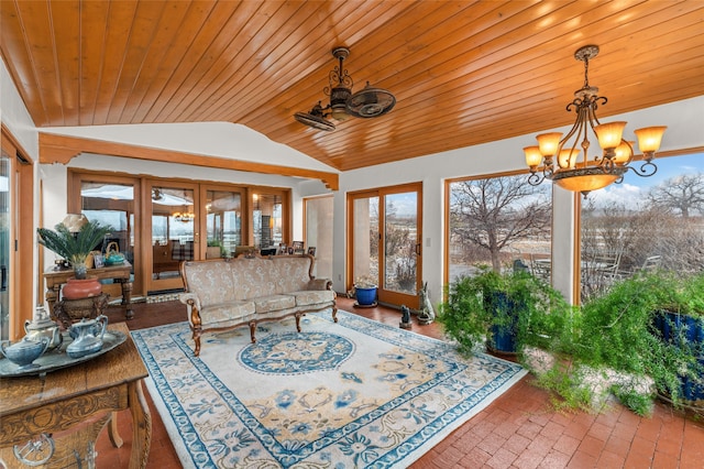 sunroom featuring wood ceiling, lofted ceiling, french doors, and a chandelier