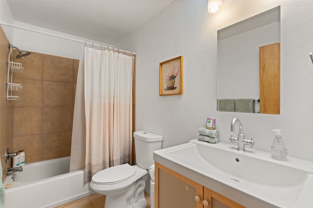 bathroom featuring toilet, tile patterned flooring, shower / bath combo, and vanity