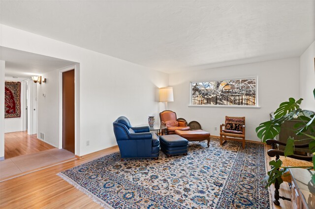 1115 N Luna Cir, Santa Fe, NM 87501 - living area with wood finished floors and baseboards