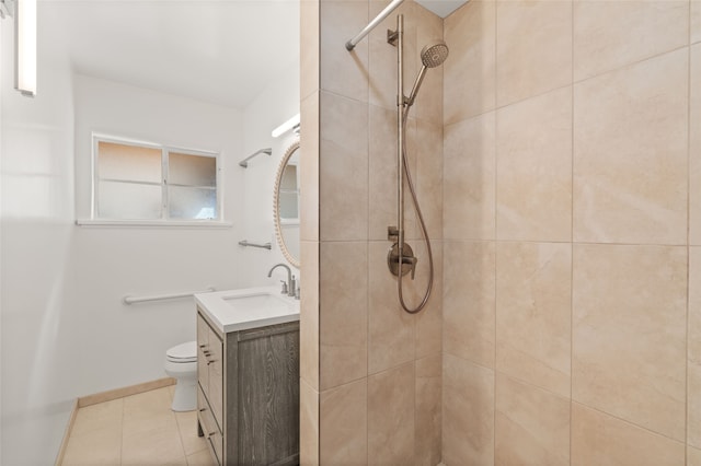 1115 N Luna Cir, Santa Fe, NM 87501 - bathroom featuring toilet, vanity, a tile shower, and tile patterned floors