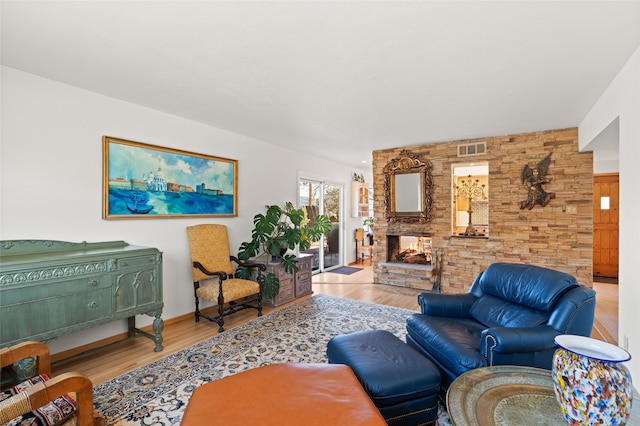 1115 N Luna Cir, Santa Fe, NM 87501 - living area featuring wood finished floors and a fireplace