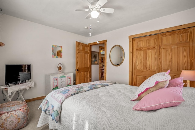 bedroom featuring ceiling fan and carpet floors