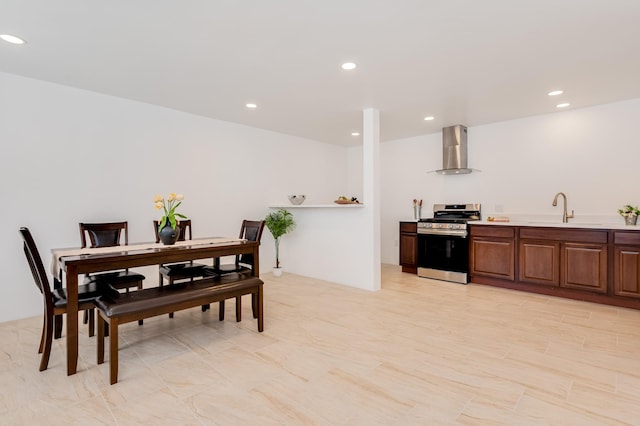 dining space featuring recessed lighting