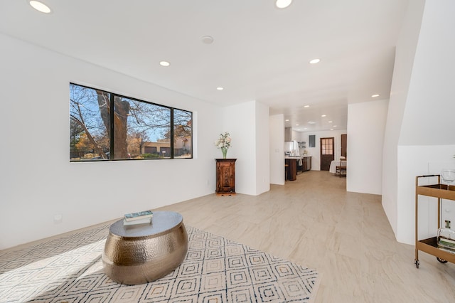 sitting room featuring recessed lighting