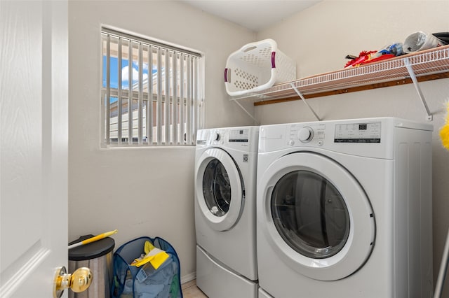 laundry room with laundry area and washer and dryer