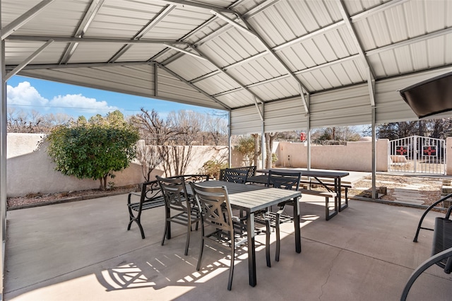 view of patio / terrace with outdoor dining space and fence