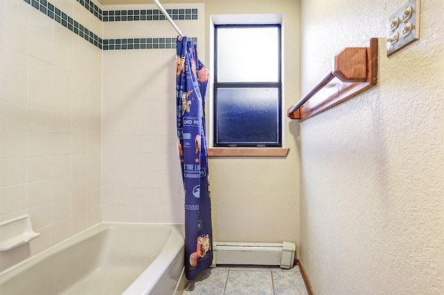 bathroom with a baseboard radiator, shower / tub combo with curtain, tile patterned flooring, and a textured wall