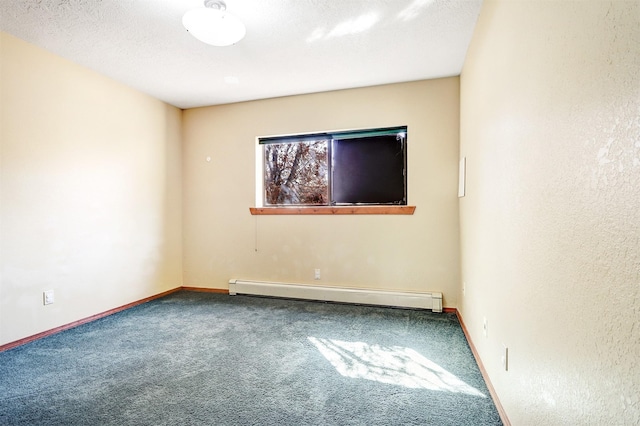 carpeted spare room featuring a baseboard radiator, baseboards, and a textured ceiling