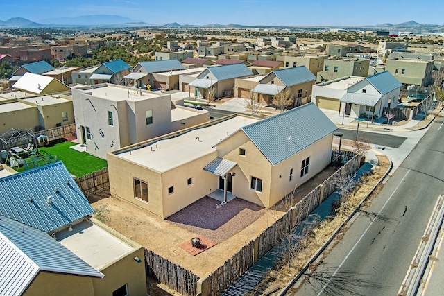 bird's eye view with a residential view and a mountain view