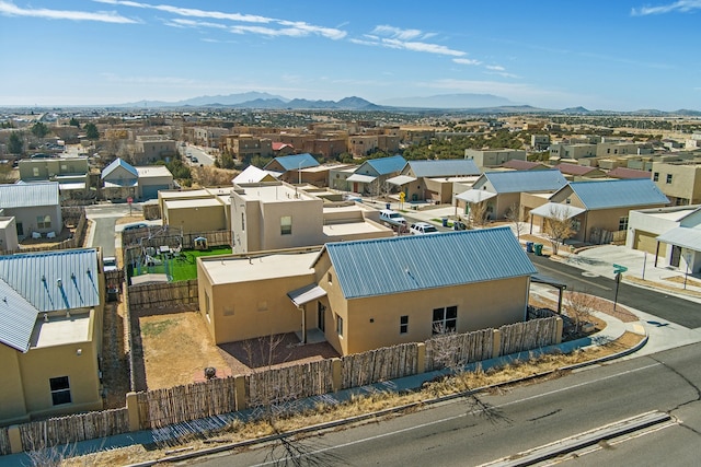 bird's eye view with a residential view and a mountain view