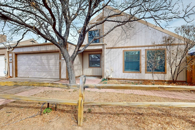 view of front of home with fence