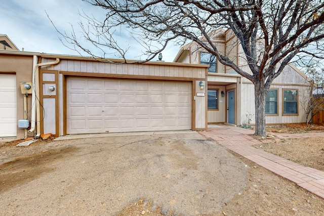 view of front of house featuring driveway and an attached garage