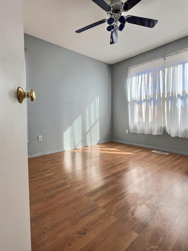 3228 El Trebol, Santa Fe, NM 87507 - spare room featuring ceiling fan and wood finished floors