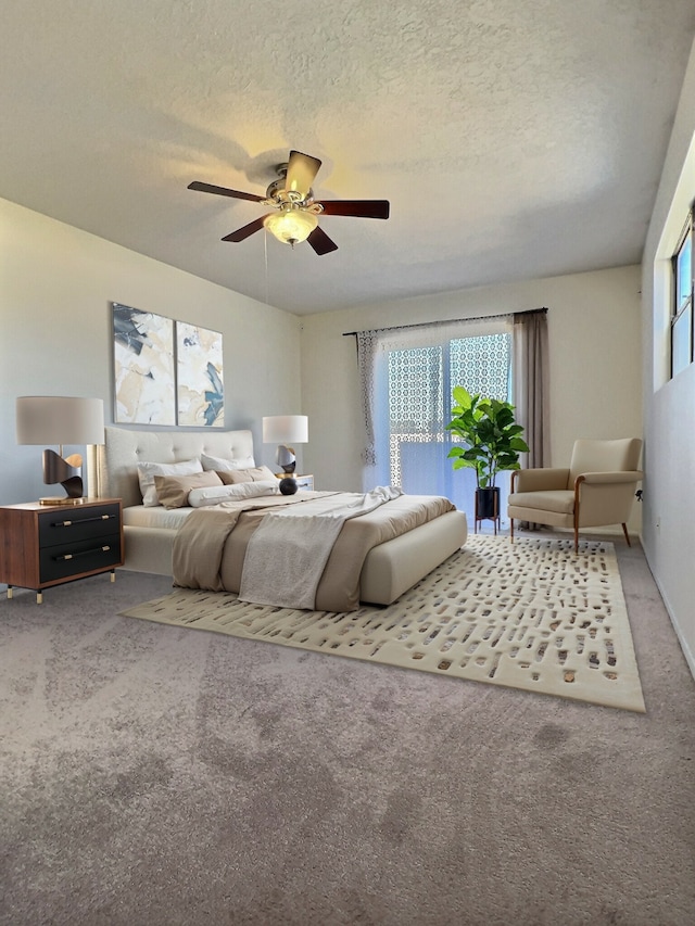 3228 El Trebol, Santa Fe, NM 87507 - carpeted bedroom with a textured ceiling and ceiling fan