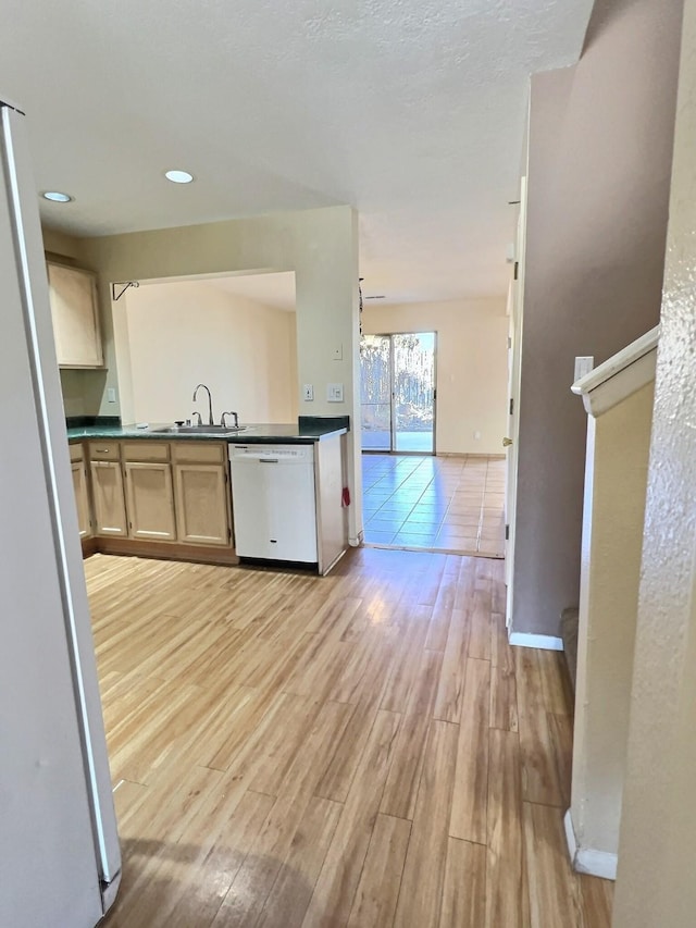 3228 El Trebol, Santa Fe, NM 87507 - kitchen featuring white appliances, light wood-style floors, dark countertops, recessed lighting, and open floor plan