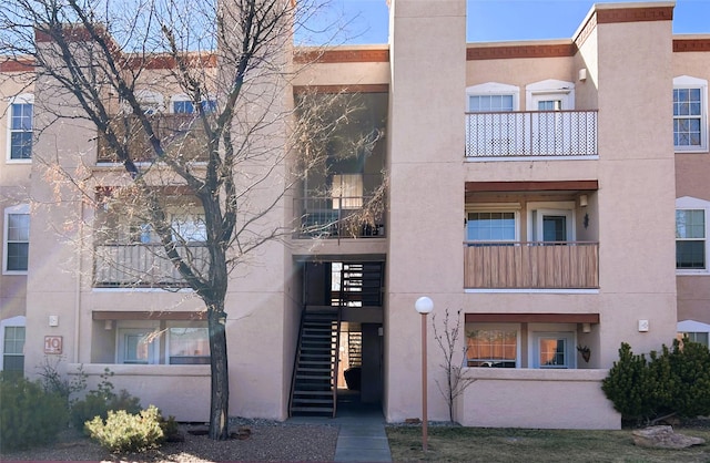 view of building exterior with stairway