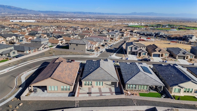 bird's eye view with a mountain view and a residential view