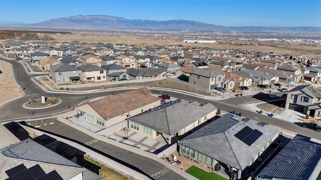 drone / aerial view with a residential view and a mountain view