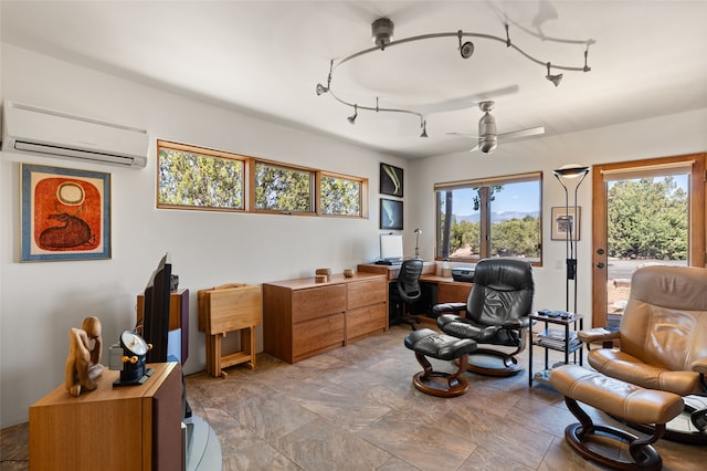 office area with ceiling fan and a wall unit AC